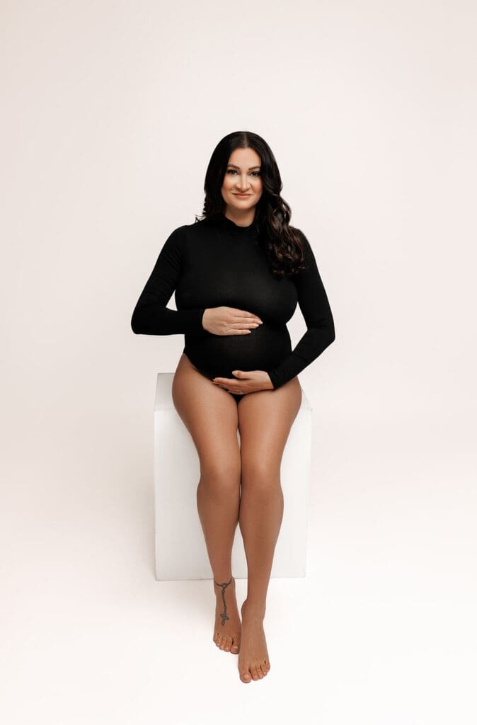 Modern maternity photos in black bodysuit