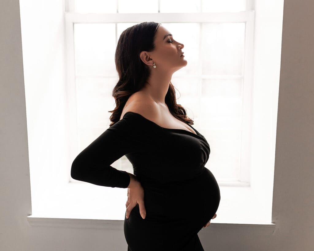 Modern maternity photos in black dress